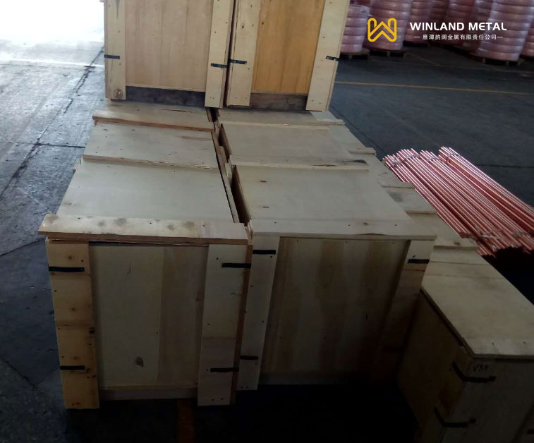 Wooden box packaging of straight copper pipes